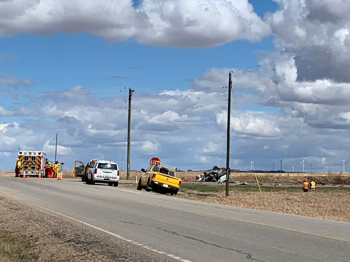 A woman was killed and two men were seriously injured in a highway crash near Three Hills on Wednesday. 