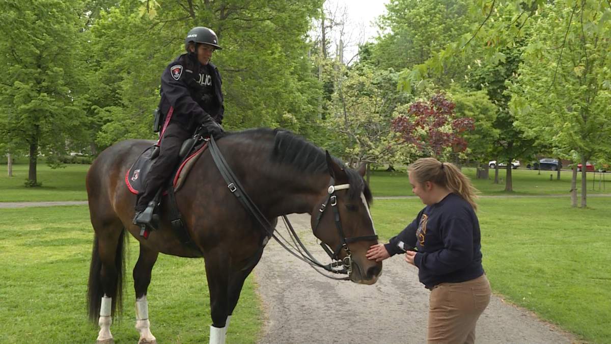 Murney and Const. Sarah Groenewegen in city park.