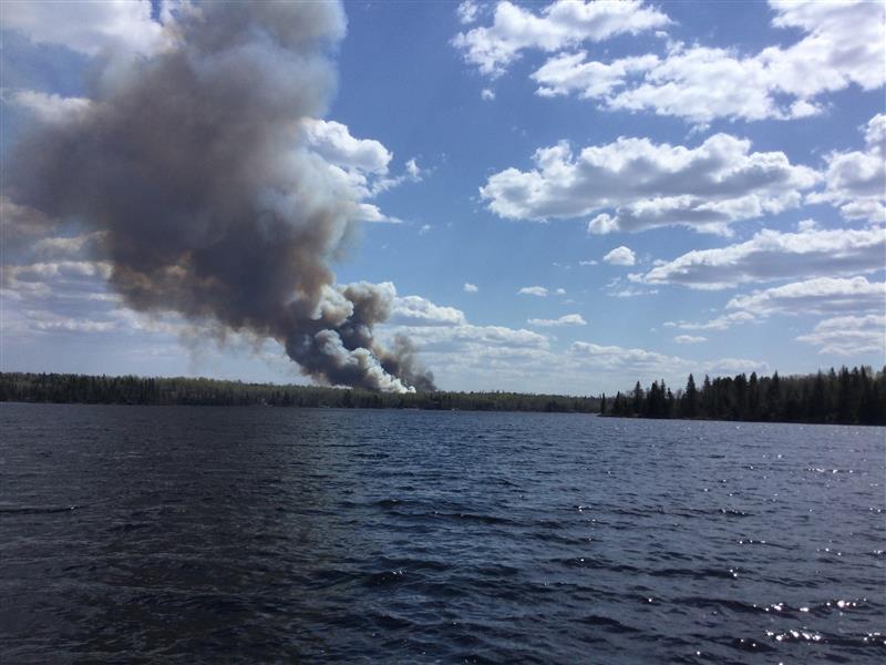 Smoke can be seen from a fire in the Whiteshell near Falcon Lake.