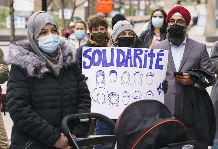 People take part in a demonstration following a Superior Court ruling on Bill 21, Quebec's secularism law, in Montreal on Tuesday, April 20, 2021. 