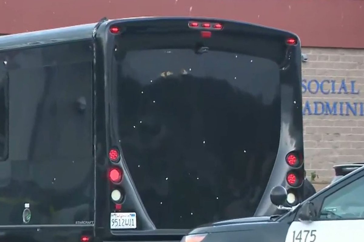 A bullet-riddled party bus is shown after an early-morning attack in Oakland, Calif., on May 18, 2021.