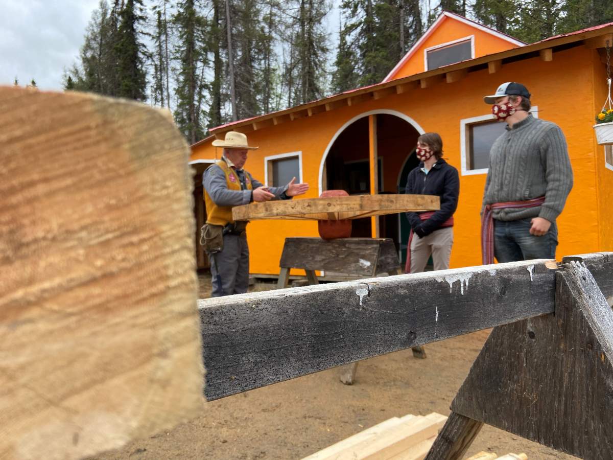 George teaching students how to make red river carts.