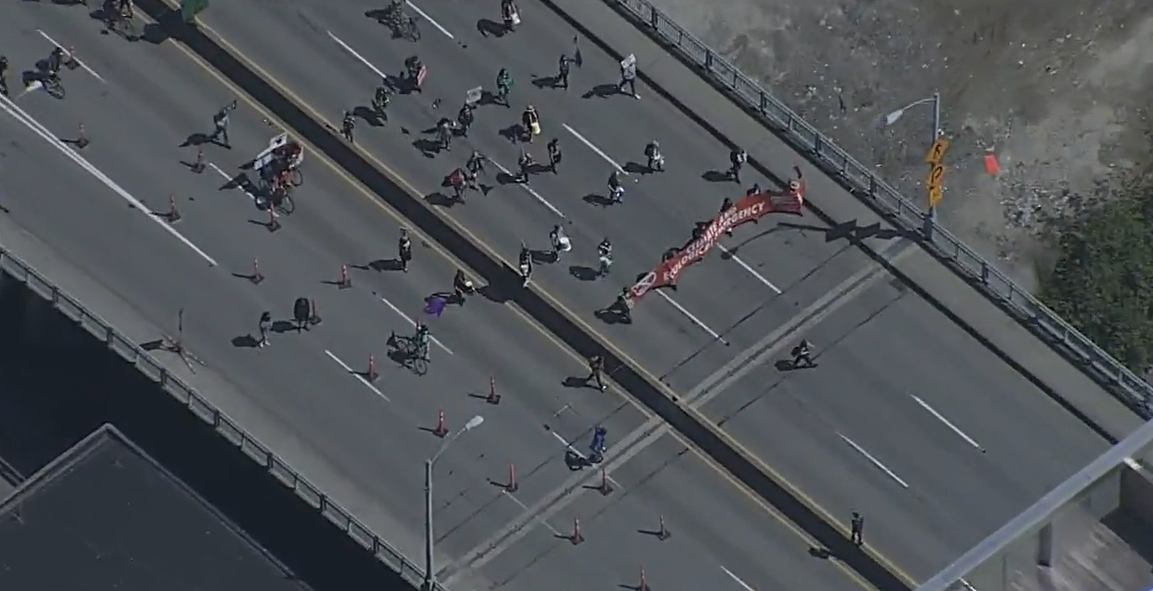 Demonstrators on the Granville Bridge on Sunday. 