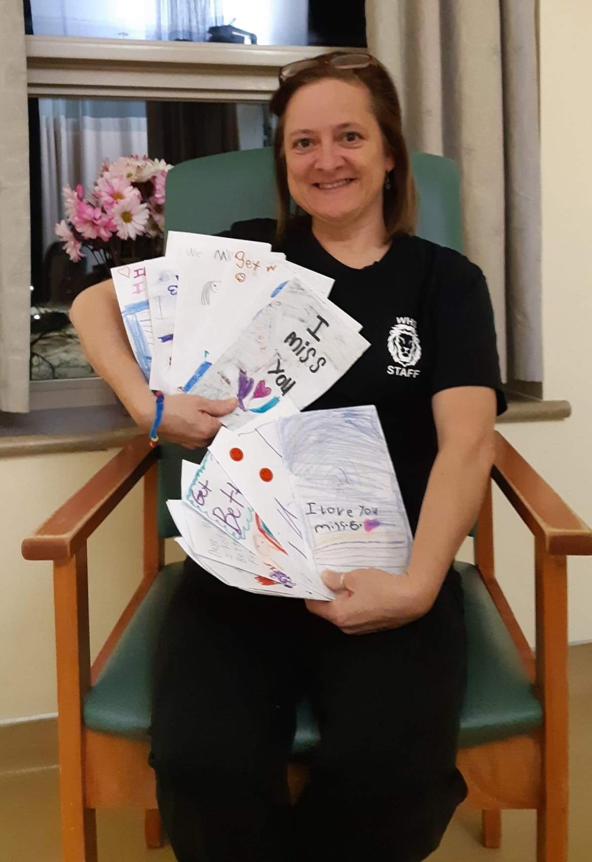 Susie Hicks-Gordon is waiting for surgery to remove a mass for testing, as well as a second biopsy. However, her procedures are currently on hold as Nova Scotia grapples with the third wave of the COVID-19 pandemic.  Here, she's holding cards made by students from the elementary school where she works as an educational assistant. 