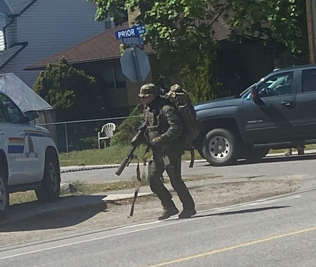 A member of the Emergency Response Team responds to a report of unlawful confinement in full tactical gear.