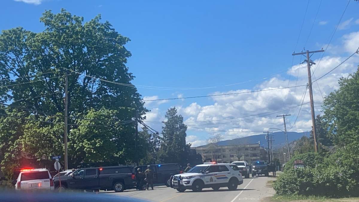 Police converge on a home in the 300-block of Prior Road N in the Rutland area of Kelowna on Sunday, May 2, 2021. 