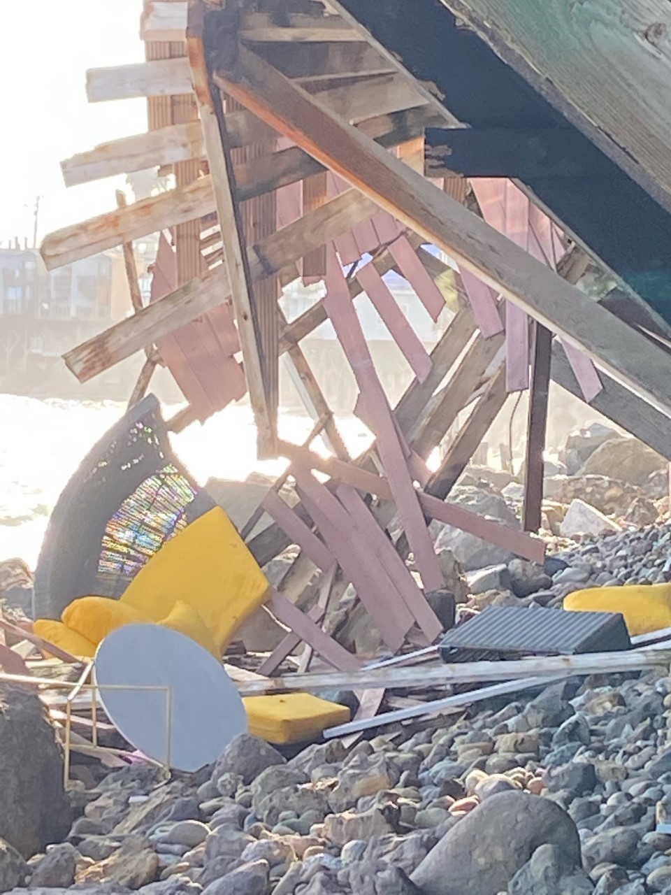 The shattered balcony of a beach house is shown on the shore in Malibu, Calif., on May 8, 2021.
