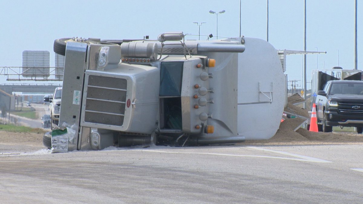 A semi roll over occurred Saturday morning in Saskatoon, spilling what appeared to be agricultural seed.