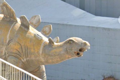 A dinosaur statue is shown in Santa Coloma de Gramenet, Spain.