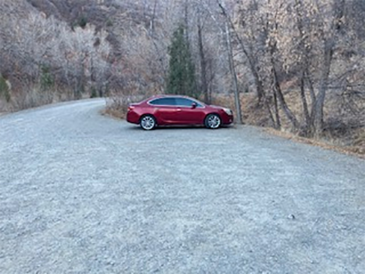 A woman’s abandoned car is shown in the Diamond Fork area of Spanish Fork Canyon in Utah.