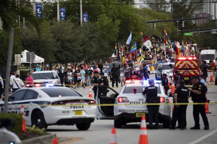Police and firefighters respond after a truck drove into a crowd of people injuring them during The Stonewall Pride Parade and Street Festival in Wilton Manors, Fla., on Saturday, June 19, 2021. WPLG-TV reports that the driver of the truck was taken into custody. 