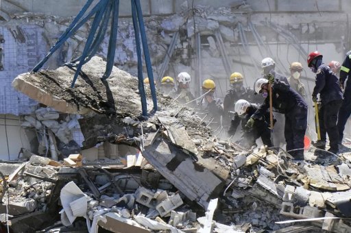 Crews work in the rubble at the Champlain Towers South Condo, Sunday, June 27, 2021, in Surfside, Fla. Many people were still unaccounted for after Thursday’s fatal collapse.
