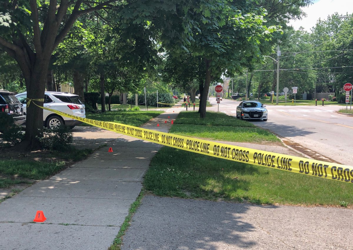Police tape and evidence markers near Colborne and Grey streets, several blocks north from where officers located the body of a deceased male Wednesday morning. The death is being viewed as suspicious.