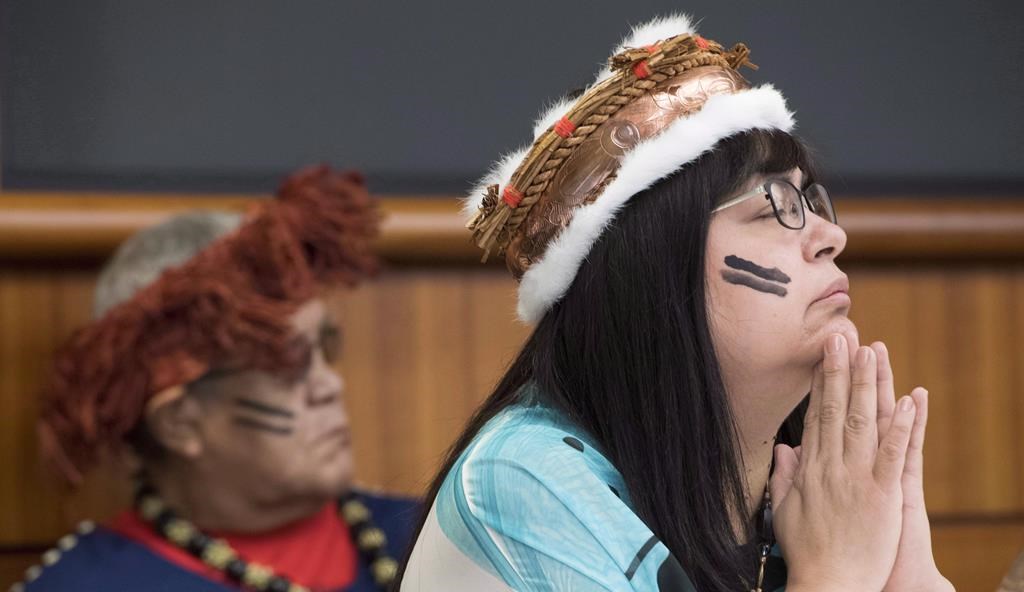 Chief councillor Marilyn Slett pauses for a moment during a news conference in Vancouver, Wednesday, Oct. 10, 2018. The B.C. government has signed a reconciliation agreement with the Heiltsuk Nation aimed at offering support for housing, language and economic development. THE CANADIAN PRESS Jonathan Hayward.