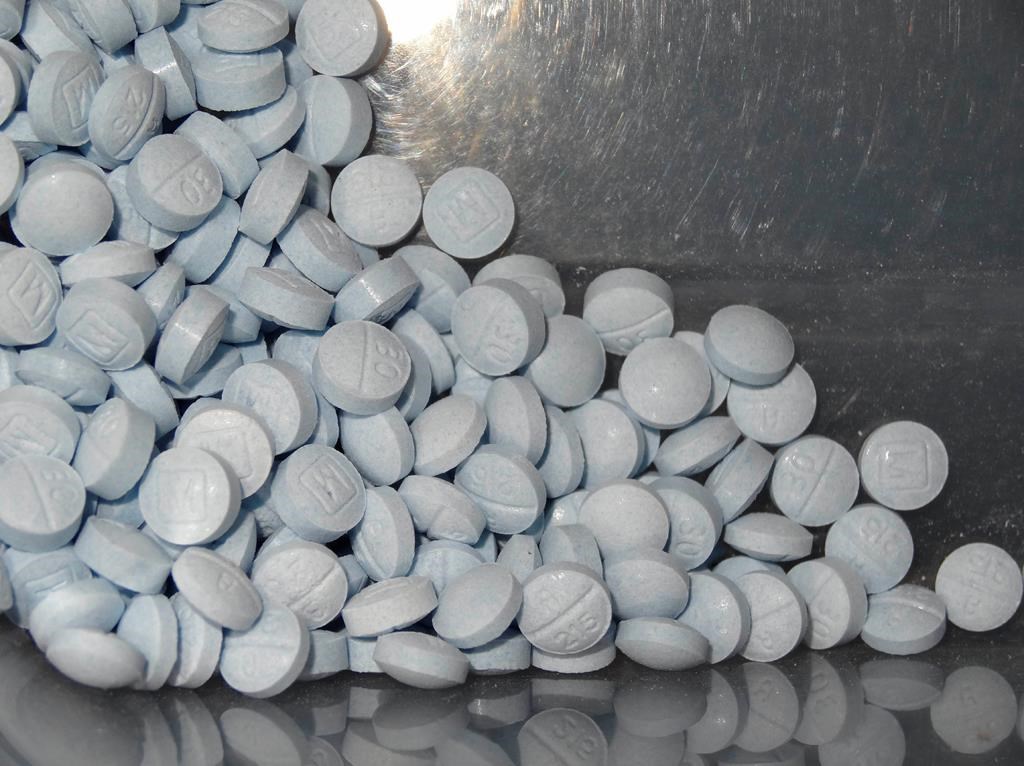 This photo provided by the U.S. Attorney's Office for Utah and introduced as evidence in a 2019 trial shows fentanyl-laced fake oxycodone pills collected during an investigation.
