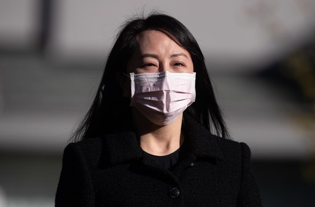 Meng Wanzhou, chief financial officer of Huawei, leaves her home to attend a hearing at B.C. Supreme Court, in Vancouver, on Monday, March 29, 2021. The Supreme Court of British Columbia has dismissed an application for a publication ban from Huawei chief financial officer Meng Wanzhou on new evidence that her legal team wants to introduce in her fight against extradition to the United States. THE CANADIAN PRESS/Darryl Dyck.