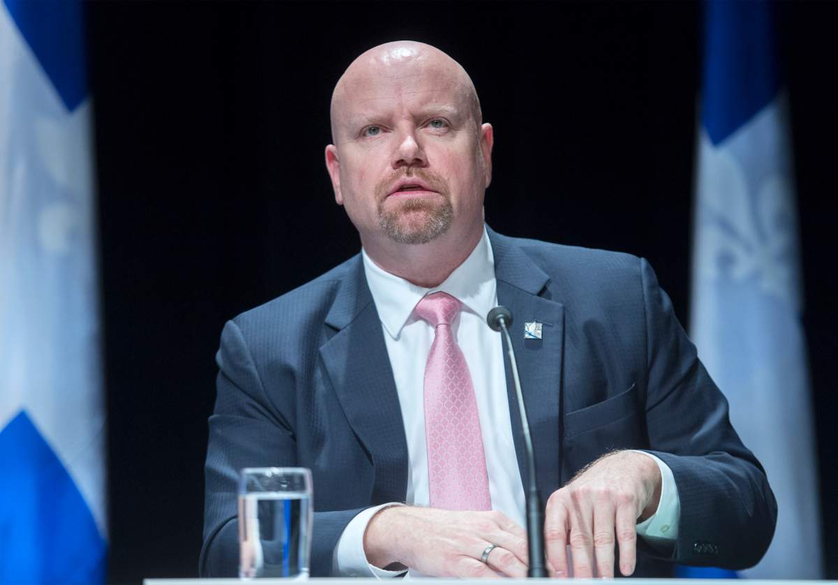 Quebec Minister Responsible for Indigenous Affairs Ian Lafreniere speaks during a news conference in Montreal, Monday, Dec. 14, 2020, where he presented a report to help fight racism in Quebec. 