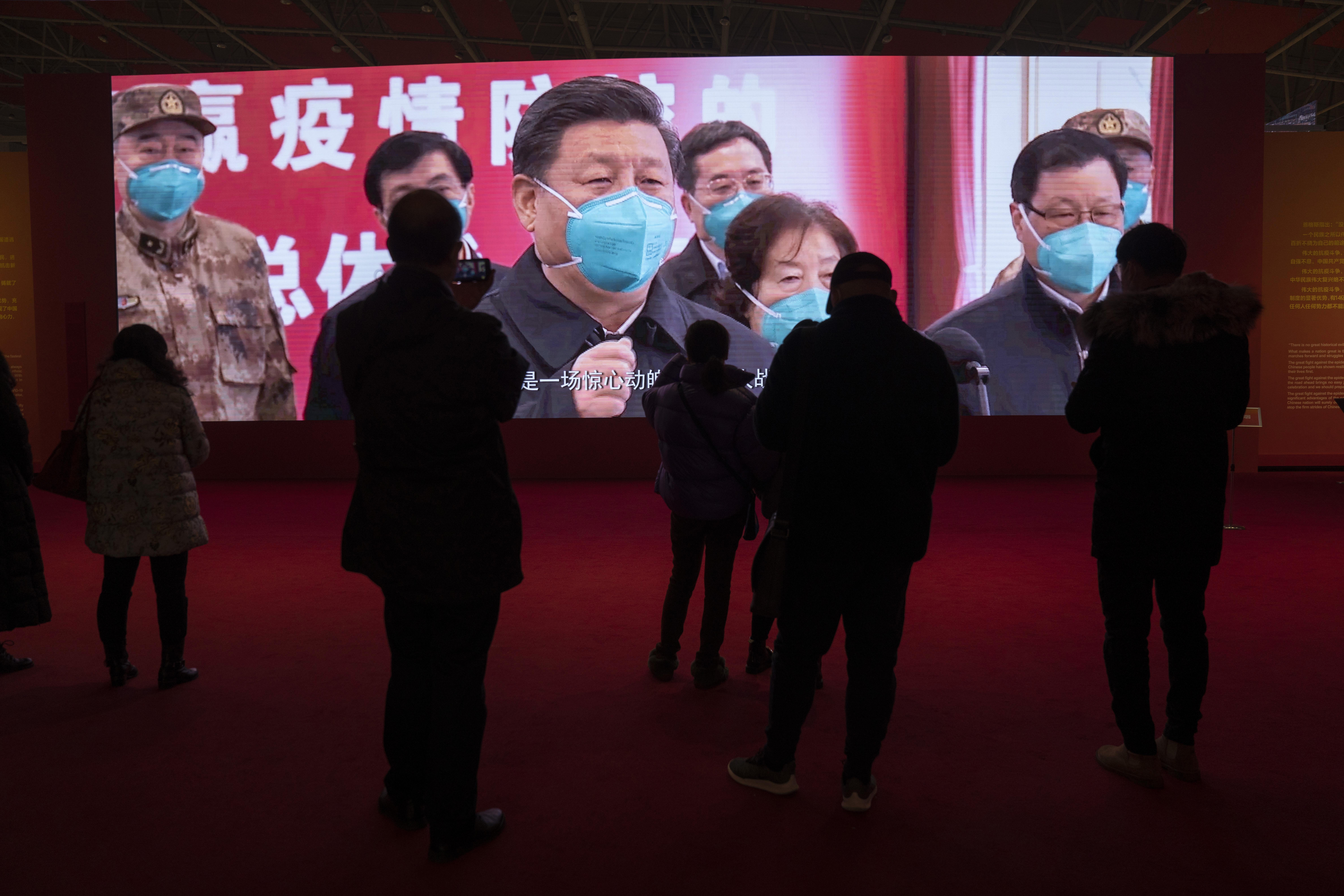 Residents attend an exhibition on the city’s fight against the coronavirus in Wuhan in central China’s Hubei province on Saturday, Jan. 23, 2021. (AP Photo/Ng Han Guan)