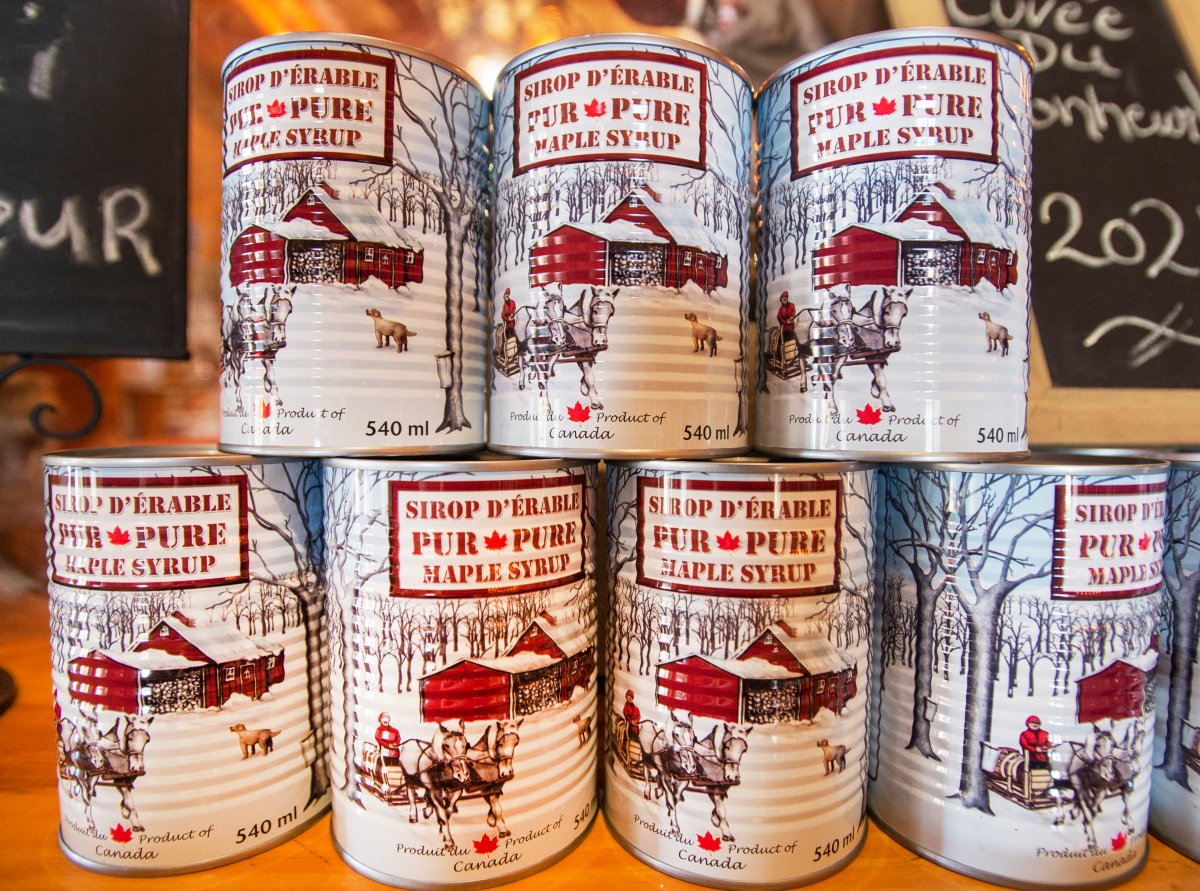 Cans of maple syrup are seen at the Bistro La dent Sucre sugar shack, Tuesday, April 6, 2021  in St. Eustache, Que. 