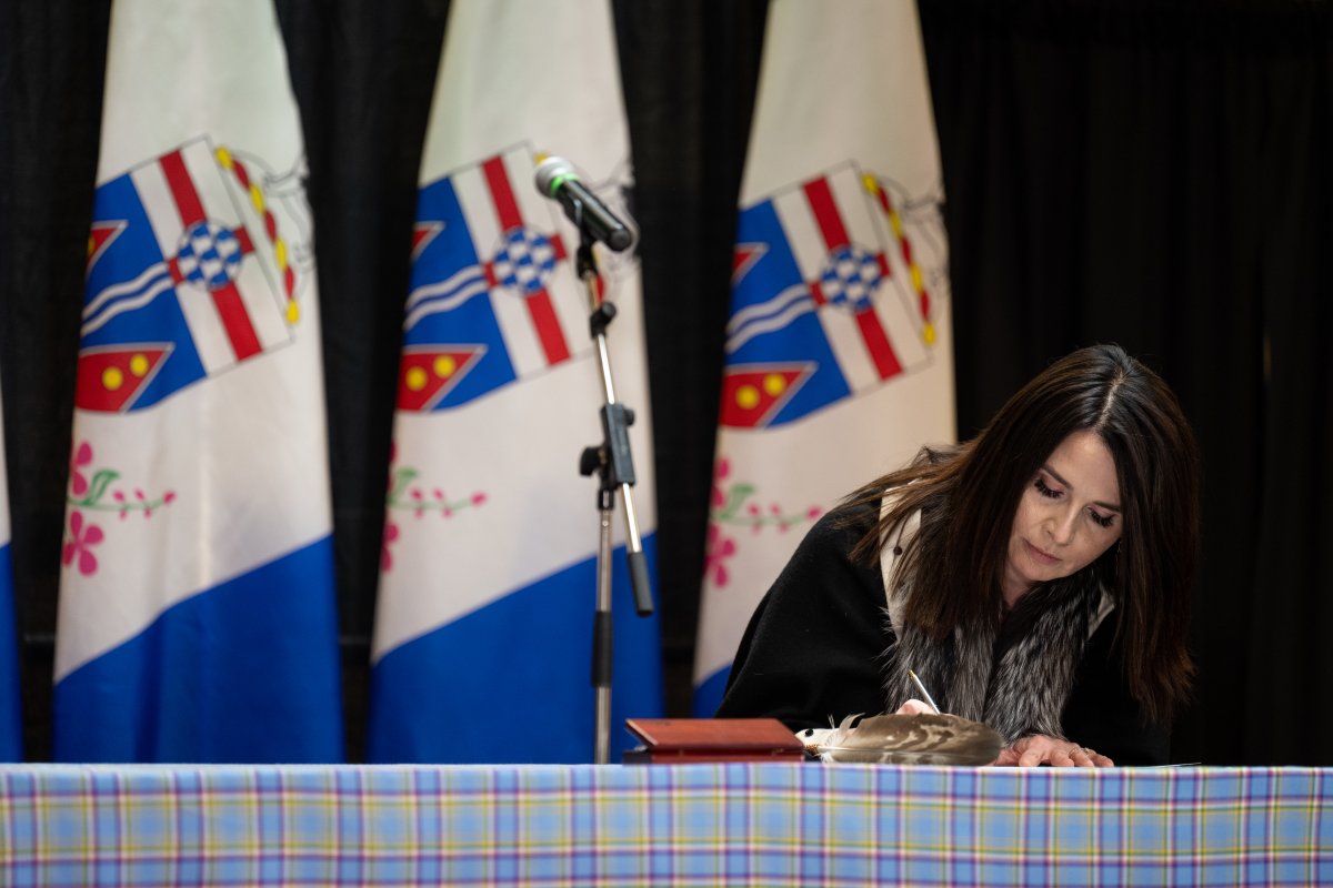Yukon MLA Jeanie McLean signs the Oaths of Office at the swearing in ceremony in the Yukon Government Legislature foyer, in Whitehorse, Monday, May 3, 2021. 