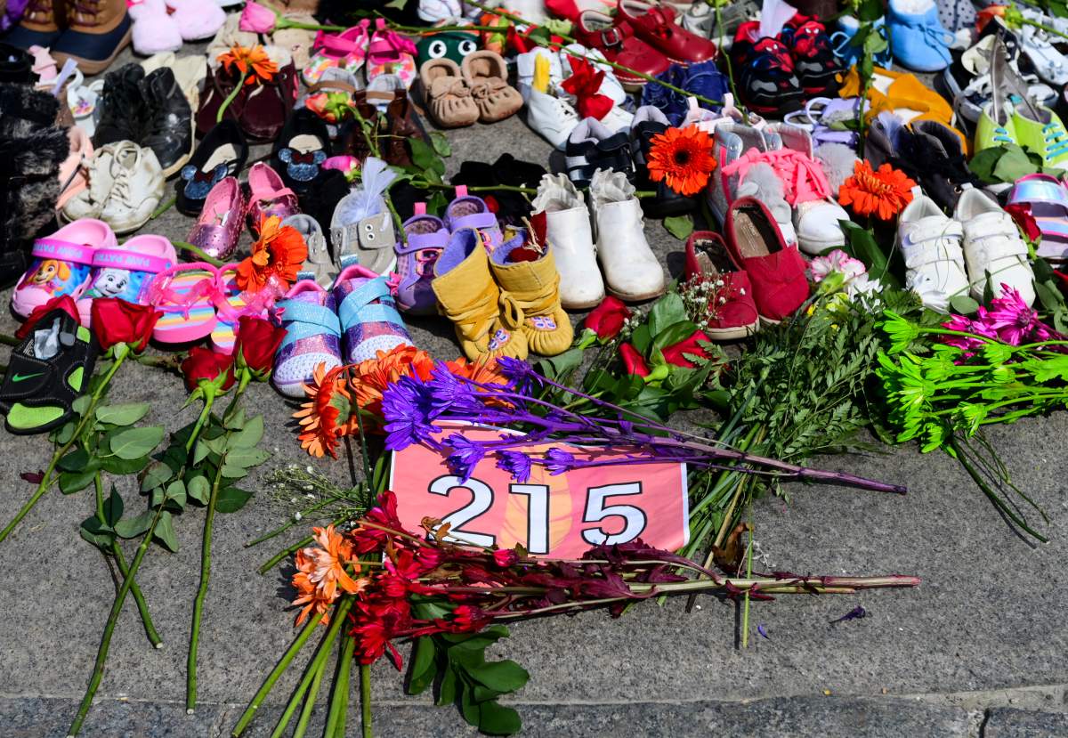 A memorial is pictured at the Eternal flame on Parliament Hill in Ottawa on Tuesday, June 1, 2021, in recognition of discovery of children's remains at the site of a former residential school in Kamloops, B.C. THE CANADIAN PRESS/Sean Kilpatrick.