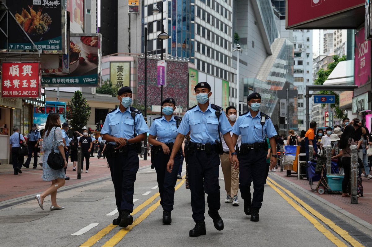 Police officers patrol near the Victoria Park in Hong Kong, Friday, June 4, 2021.