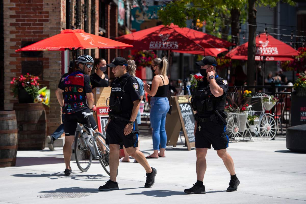 Ottawa police special constables patrol the ByWard Market in Ottawa, on Saturday, June 12, 2021.