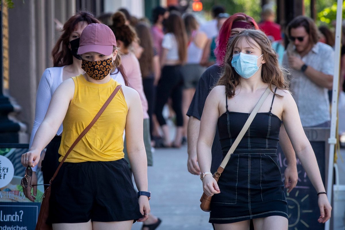 People wear masks to protect them from the COVID-19 virus in Kingston, Ontario on Saturday June 12, 2021. 