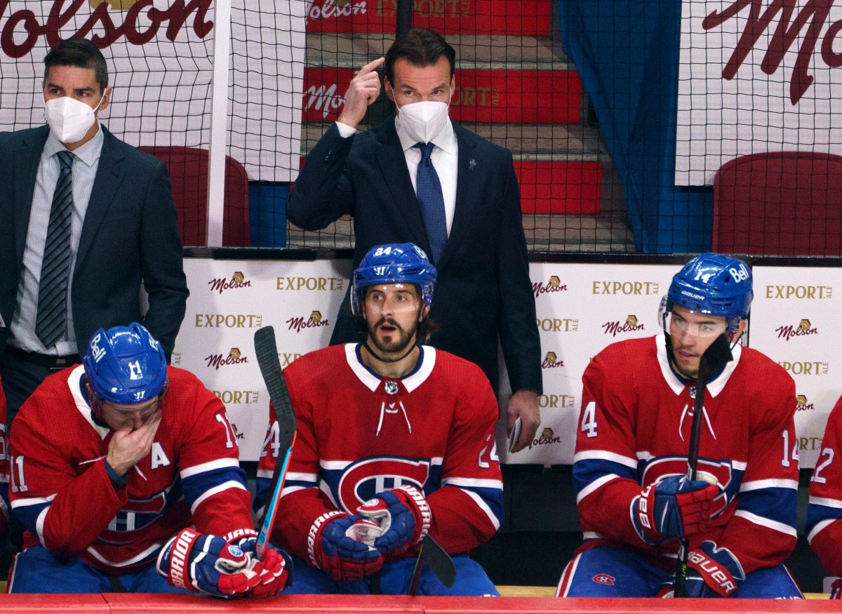 Montreal Canadiens replacement coach Luke Richardson is seen behind the team bench as they face the Vegas Golden Knights during first period of Game 3 of the NHL Stanley Cup semifinal Friday, June 18, 2021 in Montreal. 