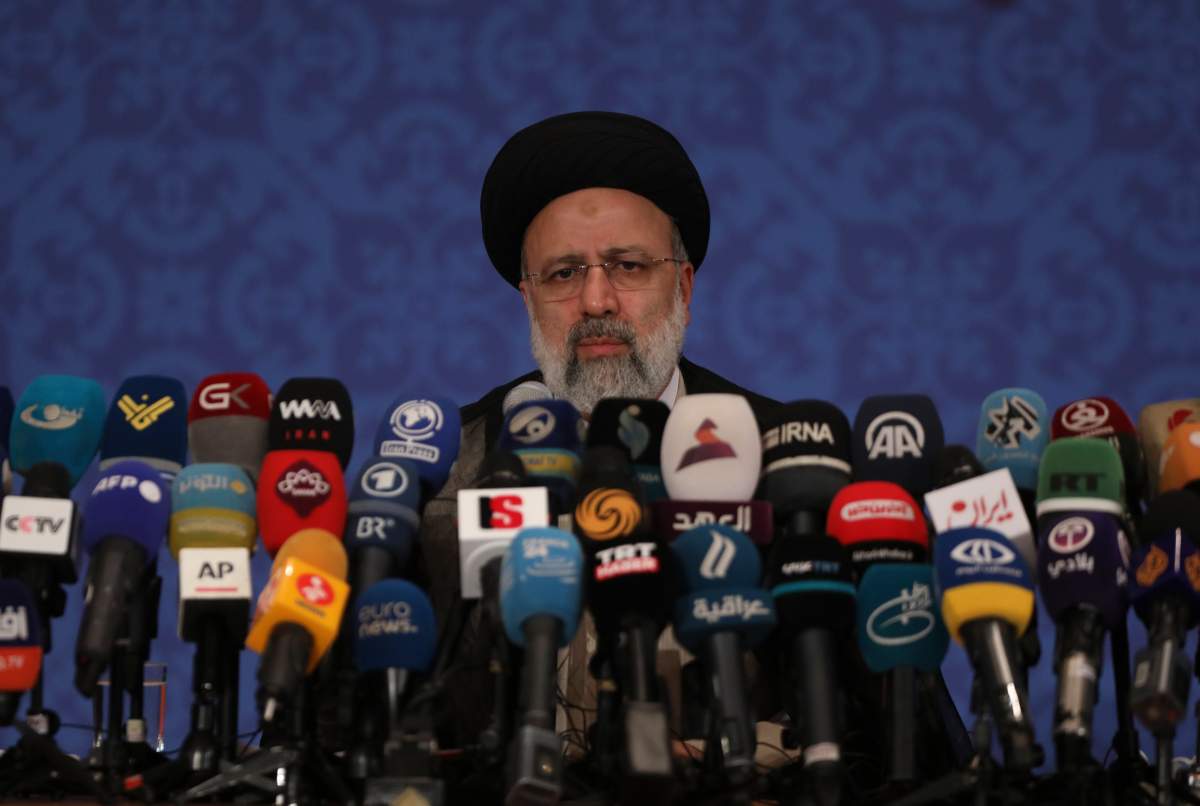 FILE - This Monday, June 21, 2021 photo shows Iran's new President-elect Ebrahim Raisi during a news conference in Tehran, Iran.