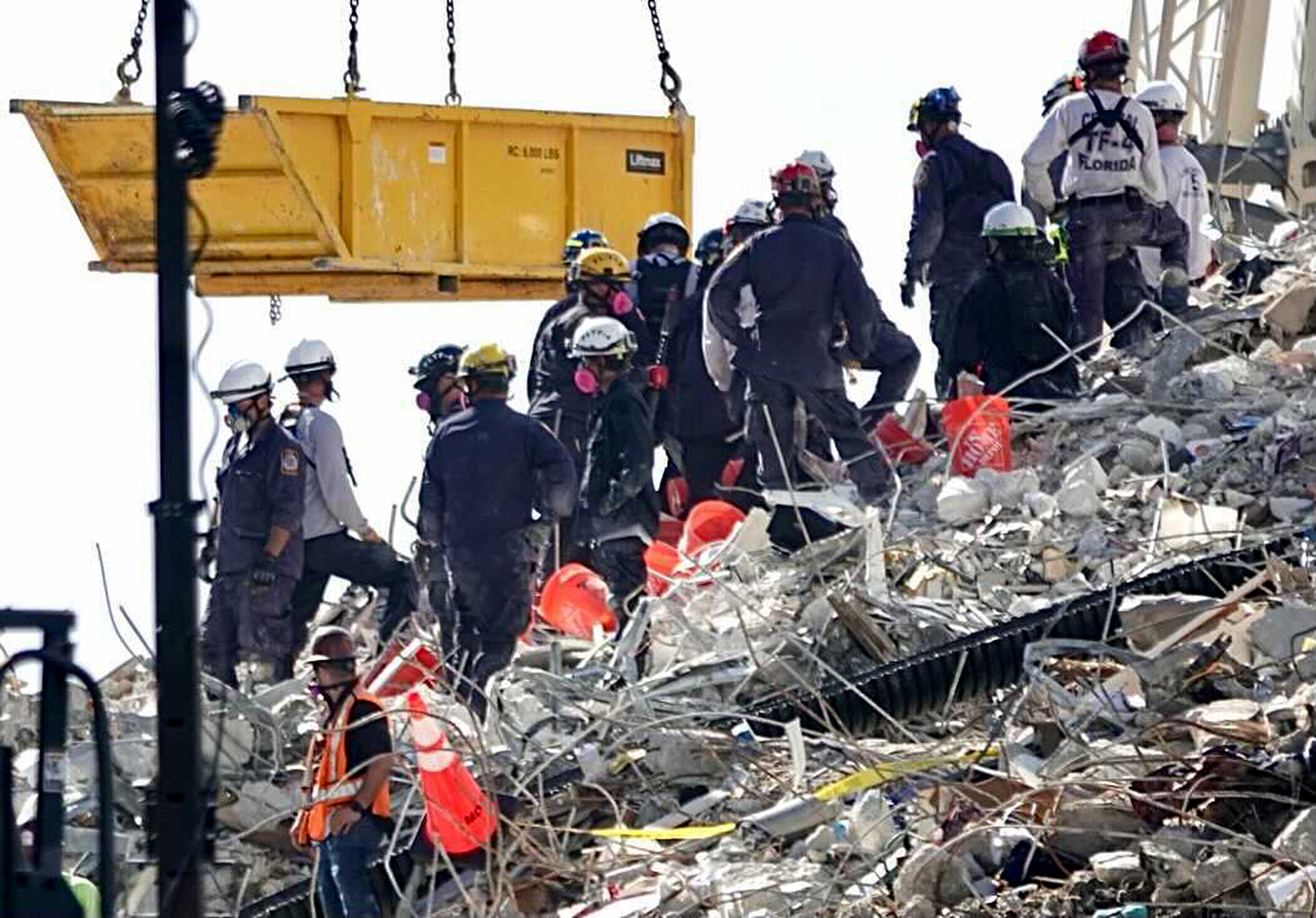 At least 20 missing as rescuers slog through mud, debris at giant Japan landslide