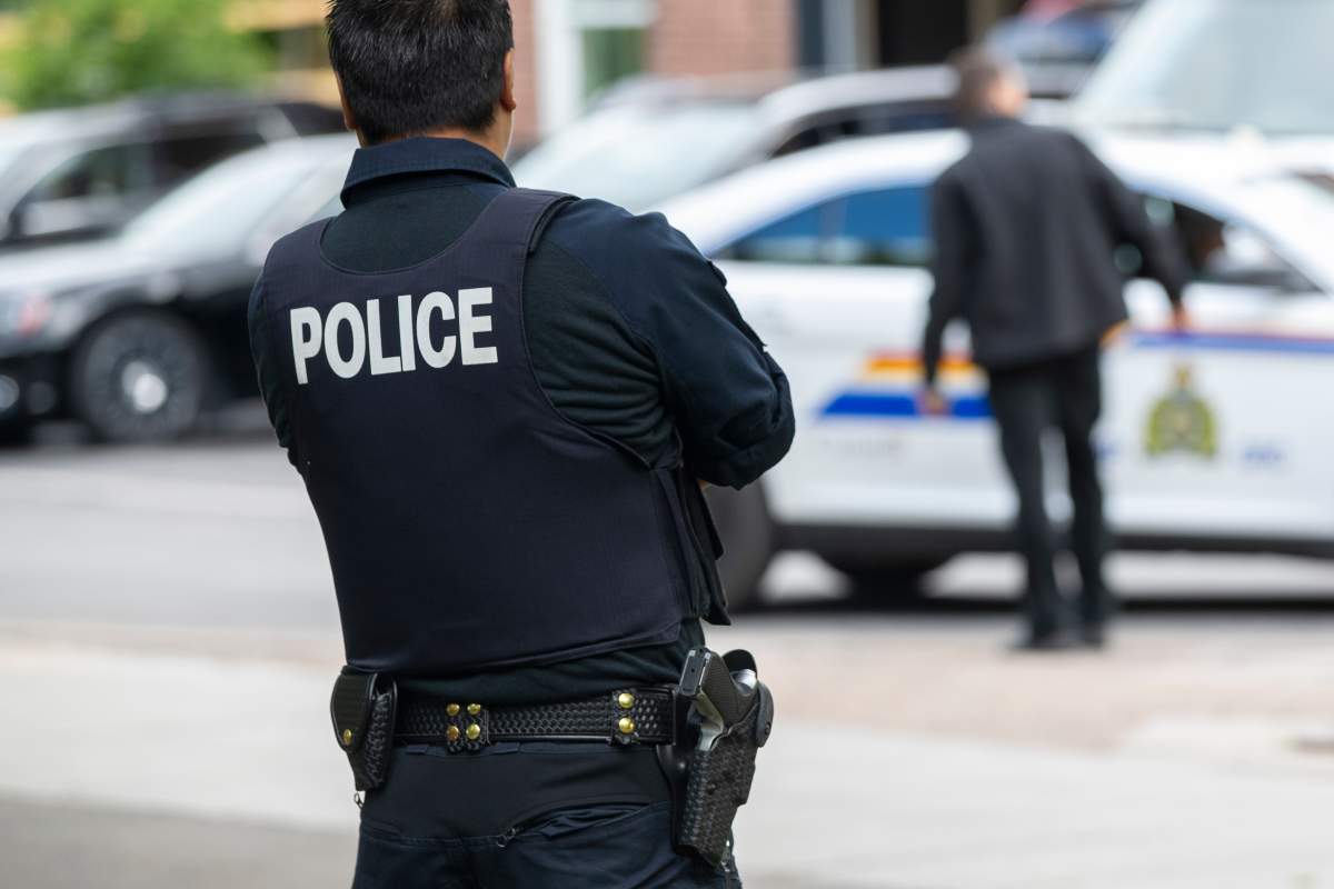 A 79-year-old woman who was the passenger on a motorcycle died after a crash and police say poor road conditions due to recent rainfall was a factor. .