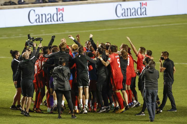 Canada celebrates a 3-0 win over Haiti in a World Cup qualifying soccer match, Tuesday, June 15, 2021, in Bridgeview, Ill. 