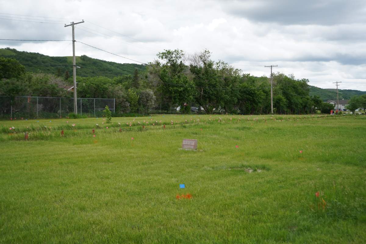 Flags currently mark unmarked graves at Cowessess First Nation.