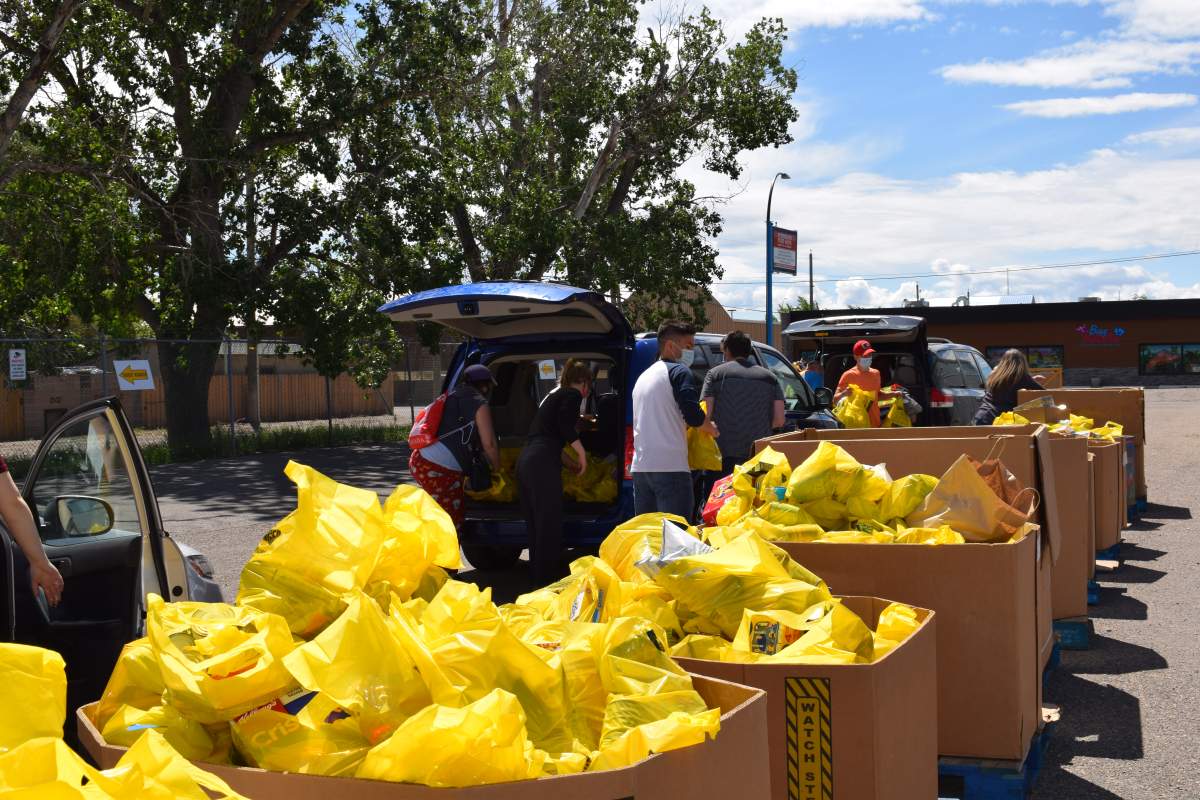 Volunteers collect food donations for the 2021 Target Hunger campaign in Lethbridge.