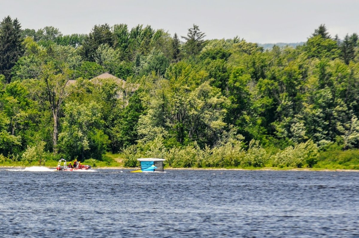 Ottawa Fire Services' water rescue team helped save two boaters stranded in near the Dêschenes Rapids on Thursday afternoon.