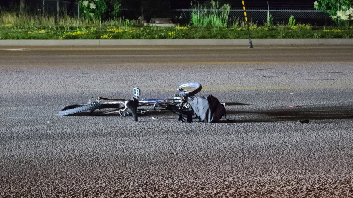 Kingston police are investigating after a cyclist was reportedly hit by a vehicle Saturday night on John Counter Boulevard. 