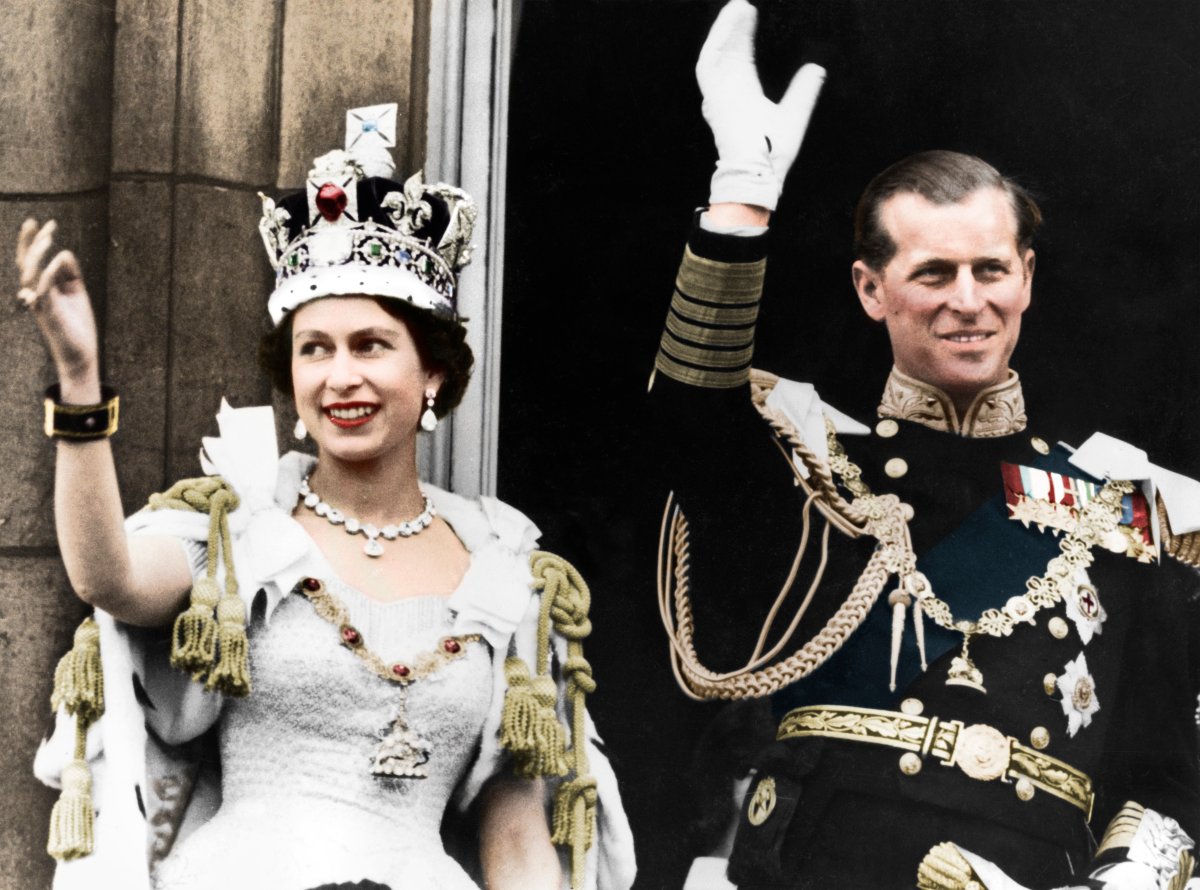 A colourized black and white print of Queen Elizabeth II and the Duke of Edinburgh on the day of their coronation, Buckingham Palace, 1953.