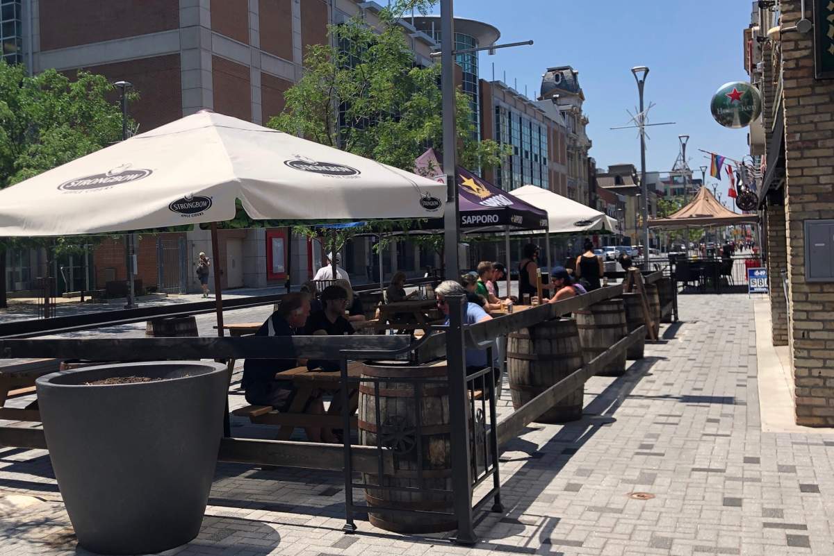 Londoners enjoy a patio along Dundas Place on June 11, 2021.