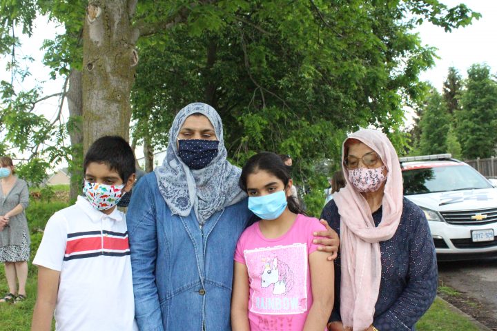 Amtul Jamil with her kids and mother at the site of the attack