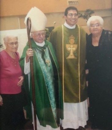 Father Cristino Bouvette with his kokum (grandmother) and Bishop Henry in 2012