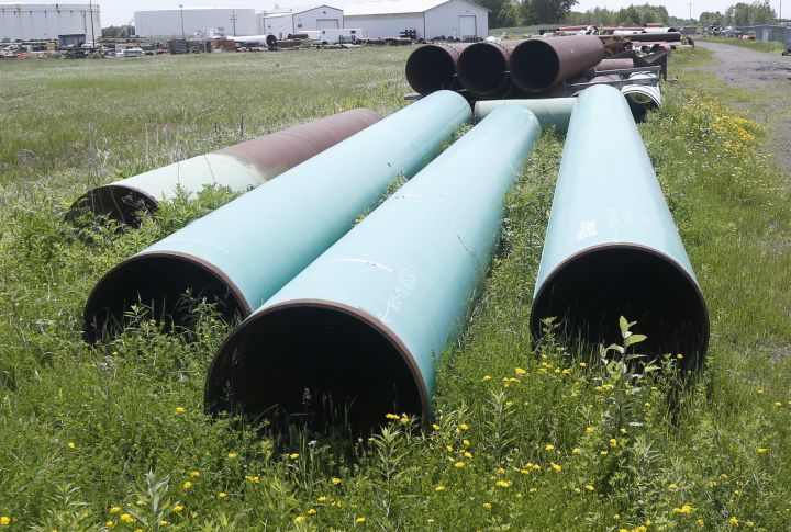 In this June 29, 2018 file photo, pipeline used to carry crude oil is shown at the Superior terminal of Enbridge Energy in Superior, Wis. 