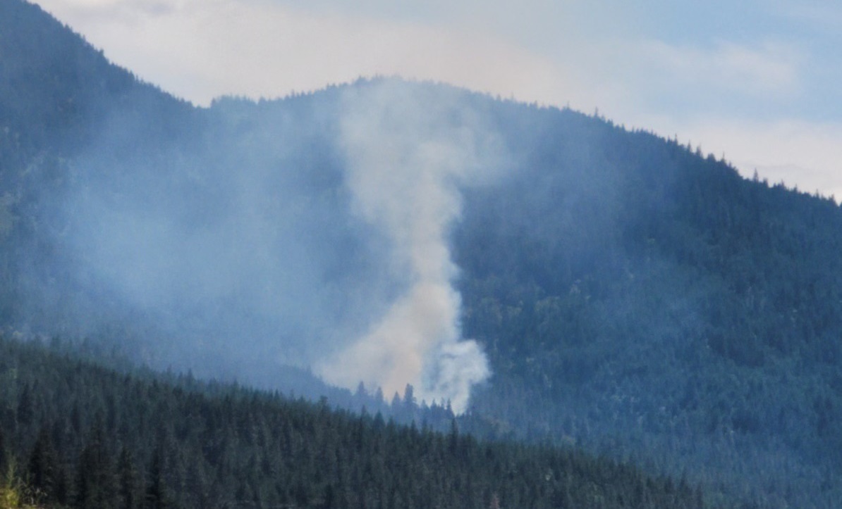 Smoke is seen coming from a wildfire near Lytton, B.C.