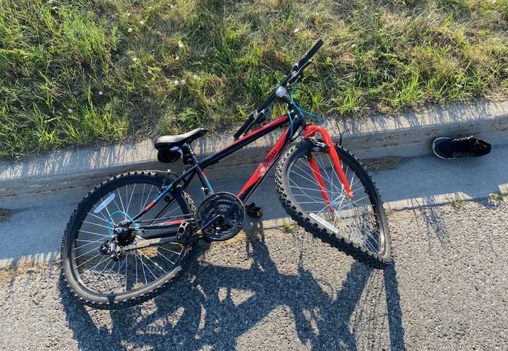 OPP officers posted a photo of the boy's damaged bike Thursday evening.