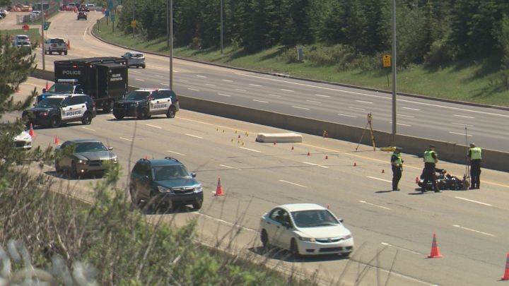 A motorcycle rider was taken to hospital after being hit by a mattress that fell off a truck while headed west on Edmonton's Whitemud Drive, police said Saturday afternoon.