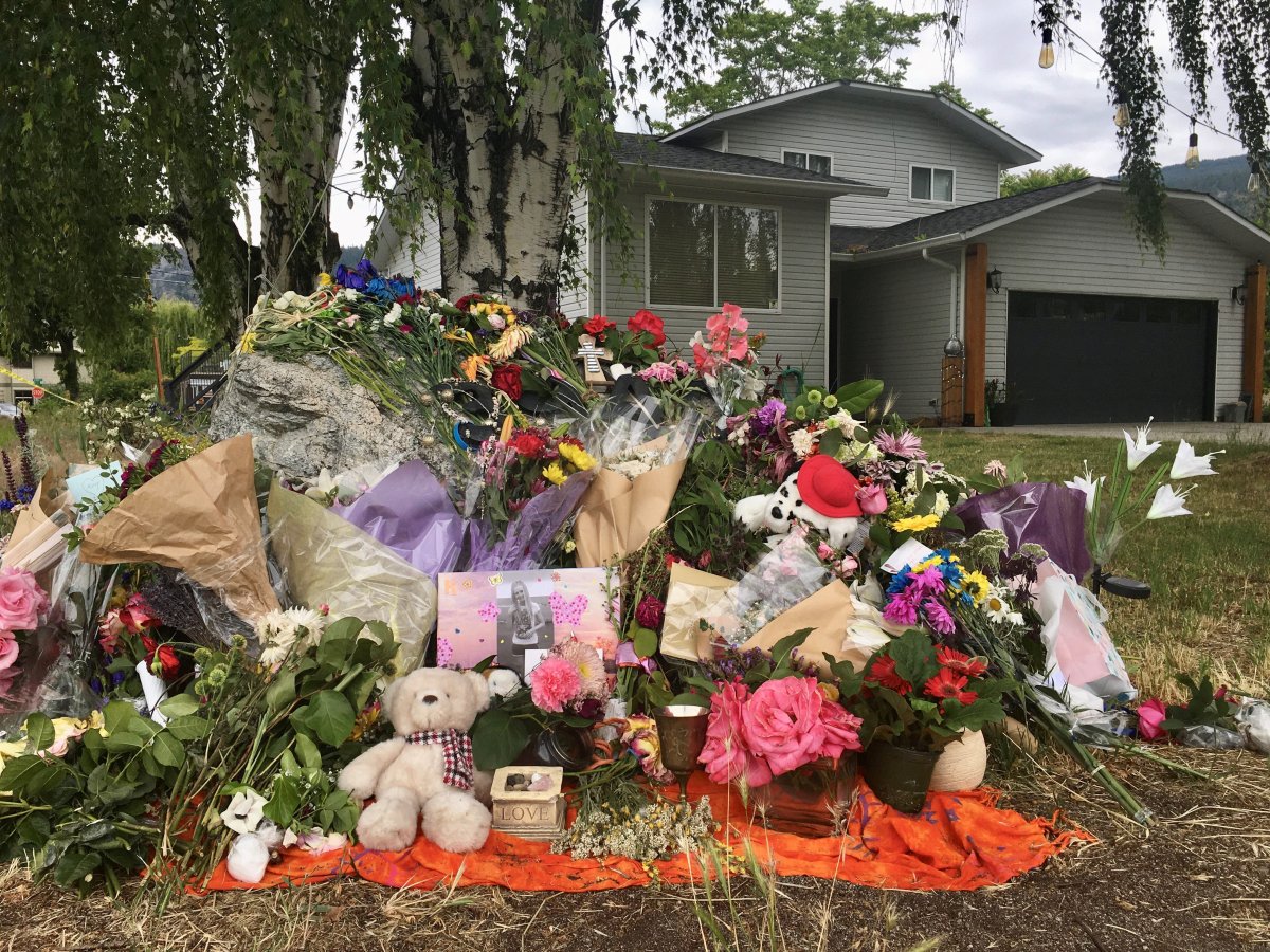 A memorial grows outside the home of 57-year-old Kathleen Richardson. Investigators believe Kathleen’s death is related to the double homicide which occurred last month in Naramata. 