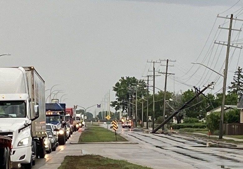 A hydro pole is the cause of traffic disruptions in Winnipeg Wednesday, June 9, 2021.