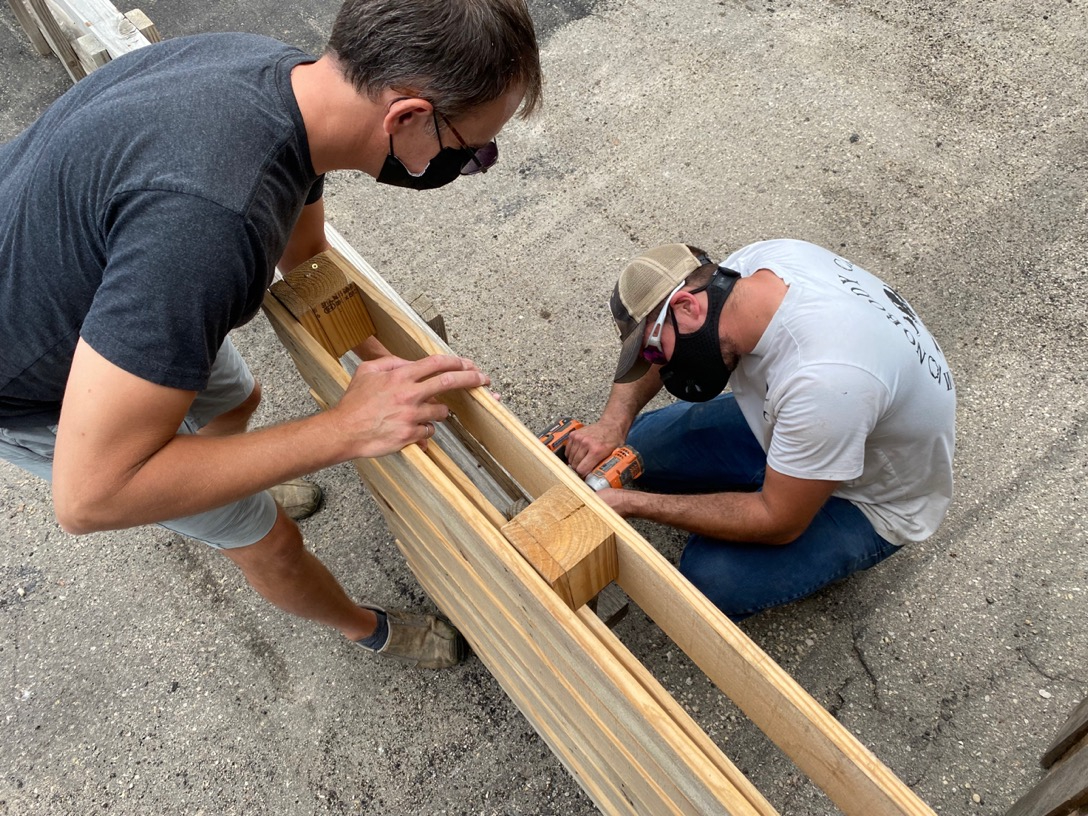 Staff at Brazen Hall get ready for opening day Saturday.
