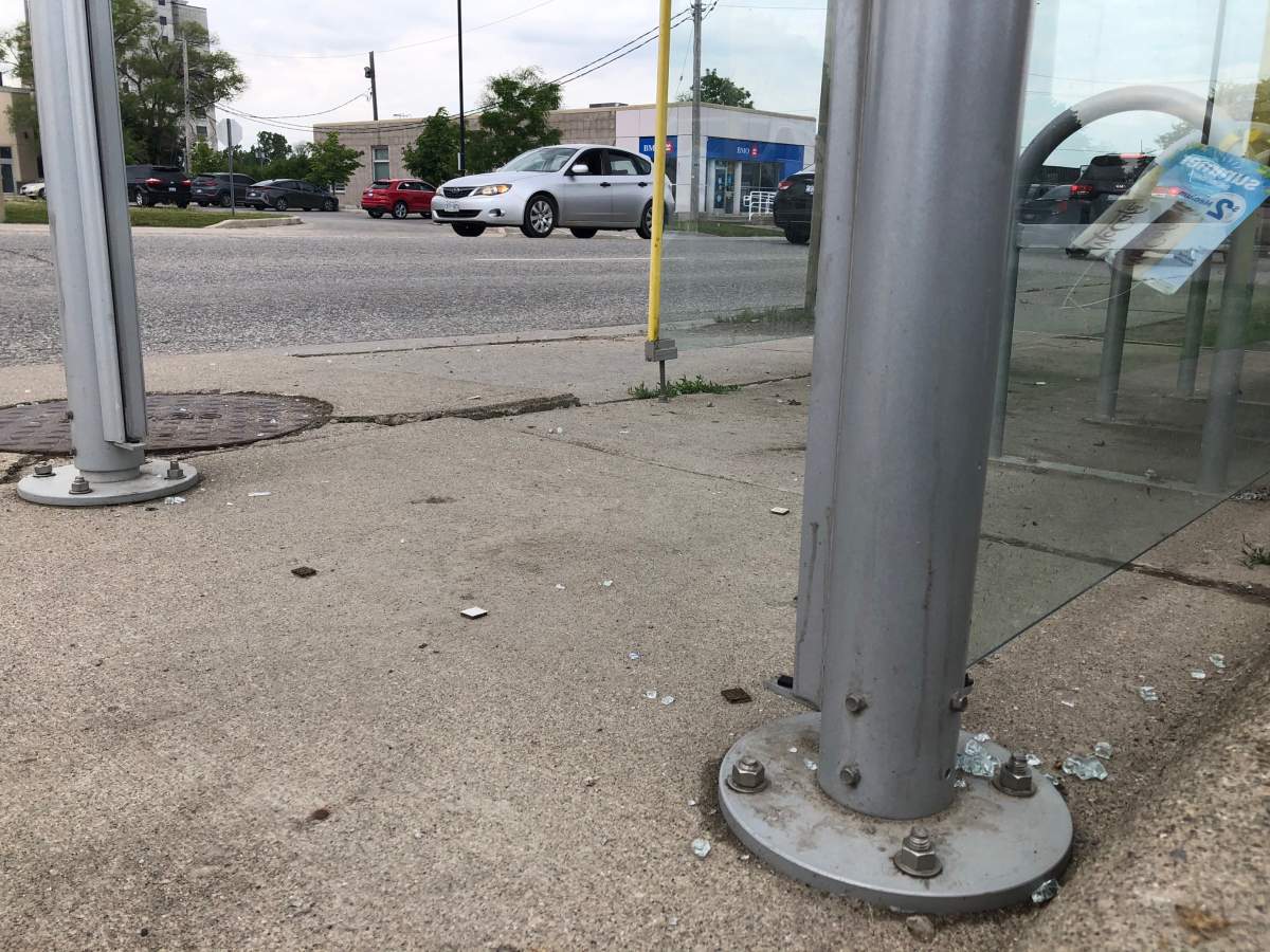 Glass shards lay at a damaged bus shelter on Wharncliffe Road South, one of 22 shelters recently damaged in London.