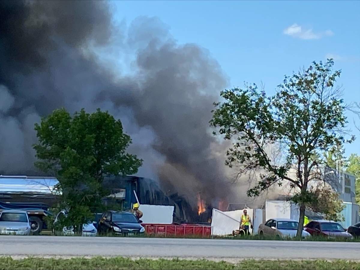 Crews work to put out the fire.